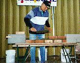 Jerry Kadansky demonstrates the techniques of bricklaying.