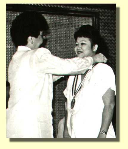 Carol being awarded by Pres. Aquino.