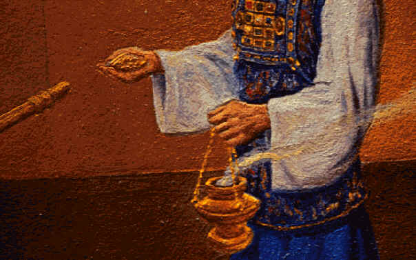 The high priest with a handful of incense