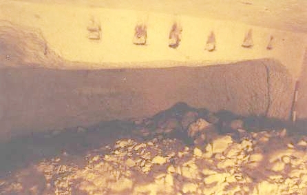 Lamp-holes above unexcavated exedra