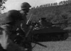 US infantry advances alongside M4 Sherman
