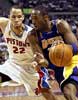 ... and Tayshaun Prince hounds Kobe while Kobe dribbles ...