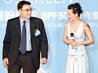 Candy Lo smiles sheepishly during press conference