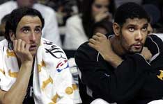 Ginobili and Duncan sit on the bench wondering what went wrong