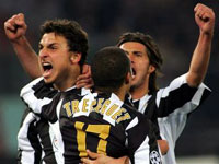 Ibrahimovic and Tacchinardi celebrate Trezeguet's goal which takes the tie into extra-time ...