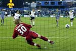 Valencia winger takes the penalty...