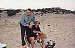 Karim hinders Hani at the camp barbecure
