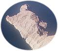 Grey Musandam Group limestones overlie the Elphinstone Group