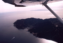 Avalon harbor with boat on course