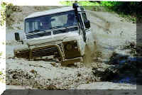 As soon as you feel you're getting stuck, back it up and try again with a different gear or a different path