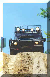 Gerardo approaching a steep descent on Level 1's Sky Hill
