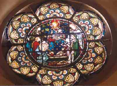 Stained glass above entrance to Church