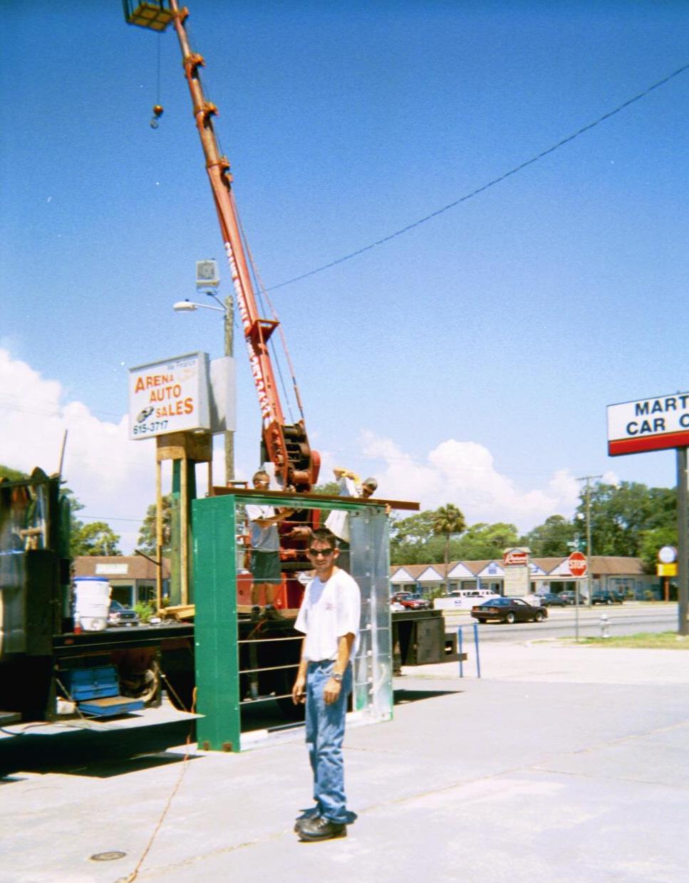 Here's Me on the job working with my good friend John installing a sign cabnet
