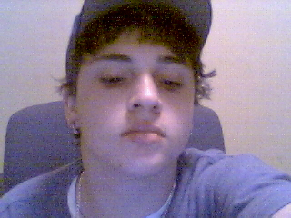 Look up at the camera - Smile - Click (Oops -Take off your hat and comb your hair - and while your at it-pull up them baggy pants and get a job!)