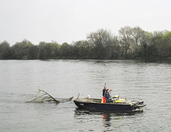 Clearing river debris prior to the main event