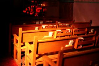 Pews and candles.