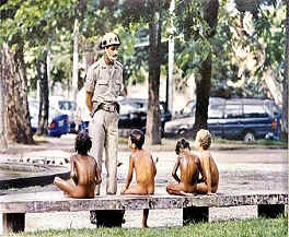 Abandoned children cooling off from the summer heat