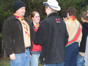 Brian and Stephanie receive 7 Scouts moving up to Venturers, held at group BBQ at Samac