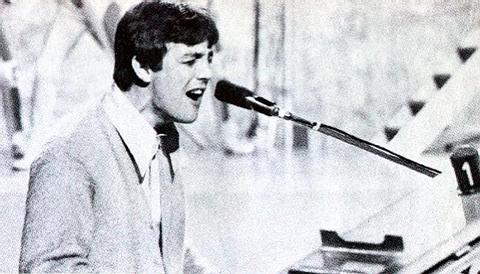 He's singing and playing keyboards, what he does best!