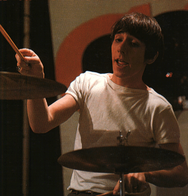 Doing what he does best.  The white t-shirt he always used to wear gave him the nickname of The White Tornado.  Any glimpse you get of him in The Who Live At The Isle of Wight will explain THAT nickname!