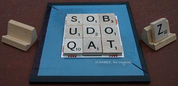  ___ 
|SOB|
|UDO|
|QAT|
 -----

(Click to enlarge.)
