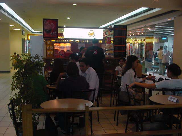 People hanging out in a coffee shop.