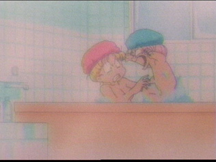 A naked Chibi Usa jumps out of the water