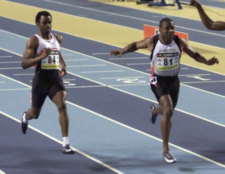Tim Montgomery (R) ahead of Greg Saddler (L), 6.53 to 6.55