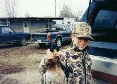 My cousin Michael LaPlant holding a mallard we killed that was missing half its bill