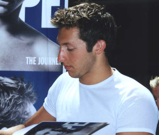 Ian signing book