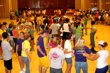 Competitors mill around the Union Ballroom waiting for the official start of this year's Purple and Gold games. More than 300 students participated in the annual Homecoming week event.