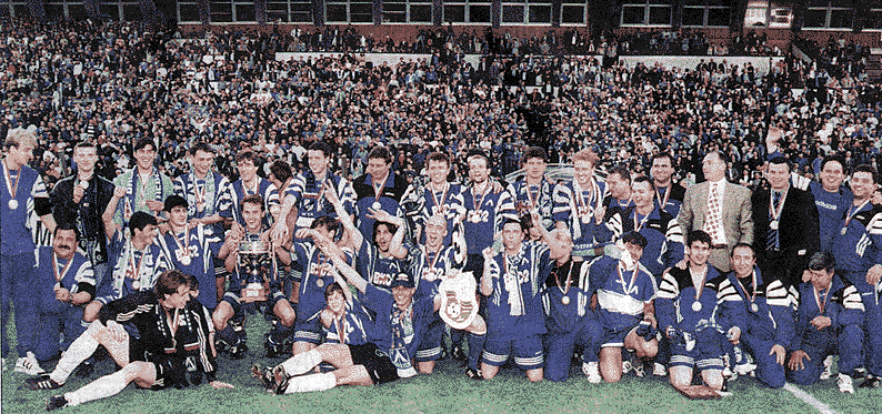 120K - The team after the match, celebrating with the cup