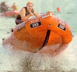 Photo of IRB coming over a small wave
