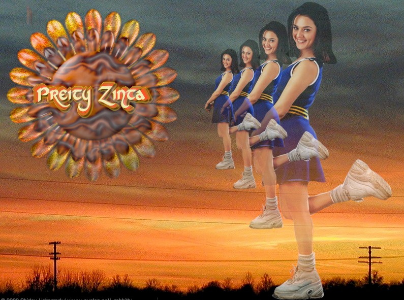 Click this to see this this pretty Priety Zinta wallpaper