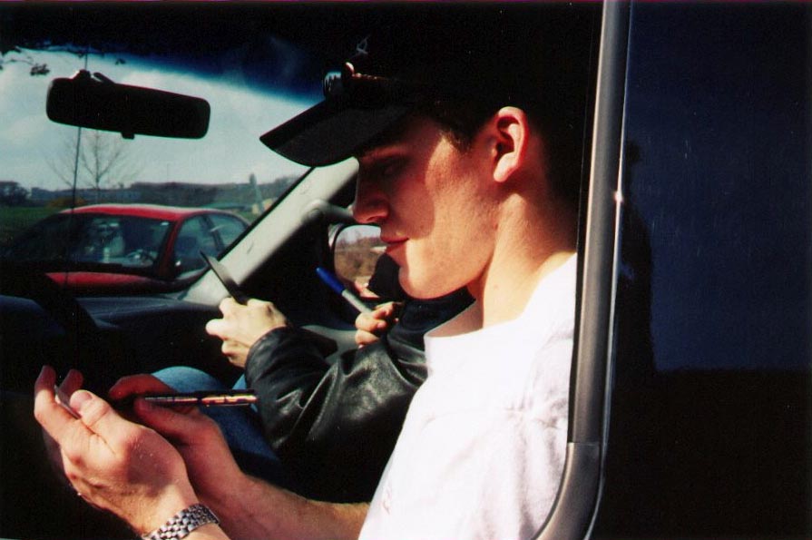 Andy Signing Autographs