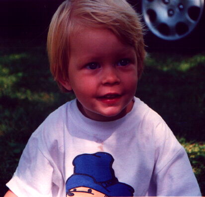 Krizia on camping with lipstick and Paddington T-shirt