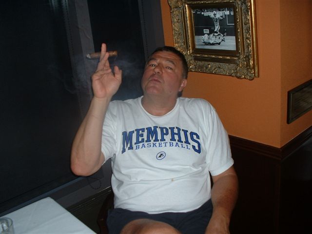 [Big Chill enjoying a post-meal cigar]