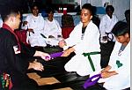 Chris Figuro receiving his Purple belt