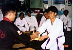 Philander Patricio receiving his Yellow belt