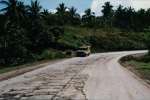 Our van on a road with pot-holes
