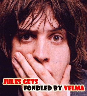 Julian Casablancas gets felt up by Velma Blades.