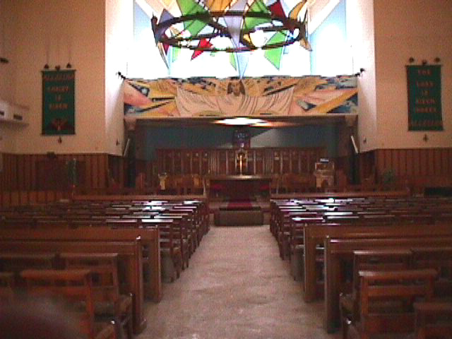 Inside the Cathedral.  The mural over the chancel is "Christ in Glory" by Hugh Sowden.