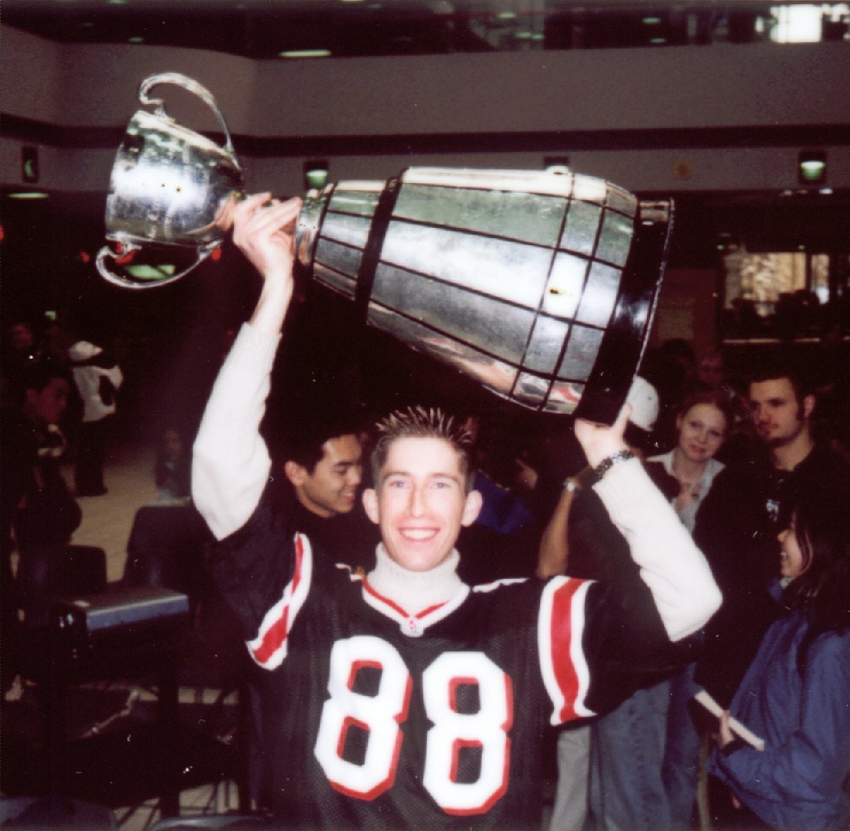 James hoisting the Grey Cup!