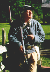Ken Wood, one of several members of the Round Table who is also a reenactor, dressed as a Confederate soldier.