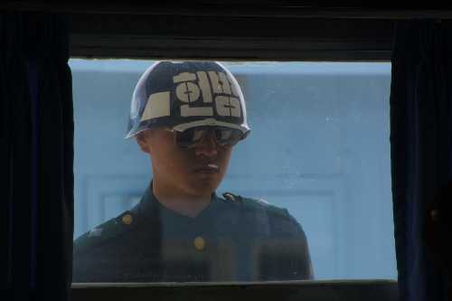 South Korean soldier looking in