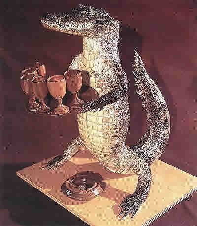 Stuffed Crocodile, wooden plate, ash tray and cups (sent by a member of the National Leadership of the Nicaraguan Sandinist National Liberation Front, March 17 1982) 