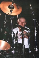 Jeff giving the cymbal some stick