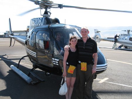 emmaandstevewiththehelicoptertheyflewon.jpg