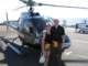 emmaandstevewiththehelicoptertheyflewon_small.jpg
