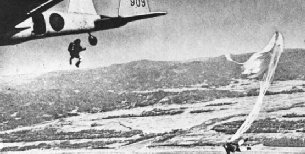 Japanese paratroopers jumping from a transport plane